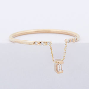 Gravity chain baguette diamond ring