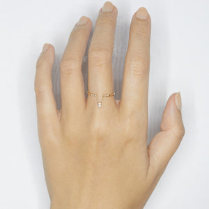 Gravity chain baguette diamond ring