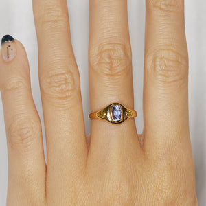 Neptune oval light blue sapphire diamond ring