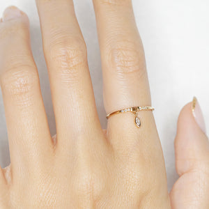 Gravity baguette and marquise diamond charm ring