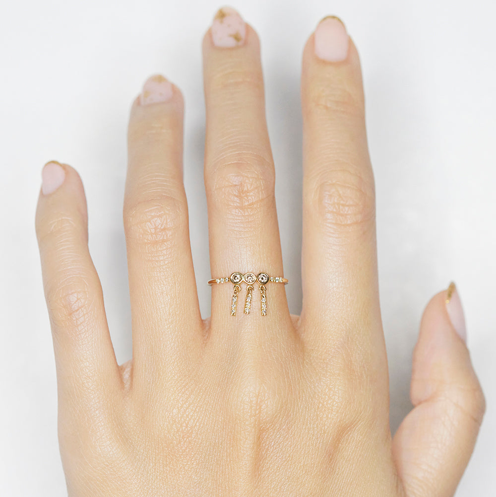 Gravity 3 round champagne diamond tassel ring