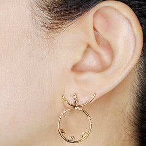 Gravity statement diamond earrings