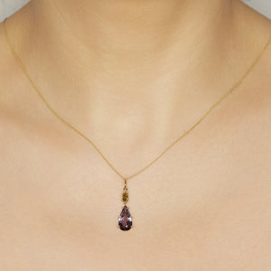 Galaxy pear diamond and purple spinel pendant