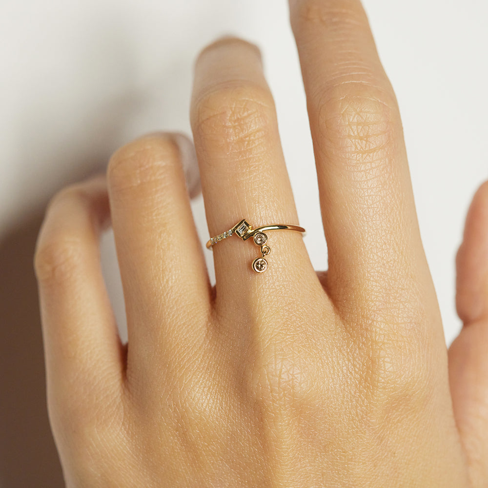 Gravity bypass baguette champagne diamond ring