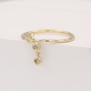 Gravity bypass baguette champagne diamond ring