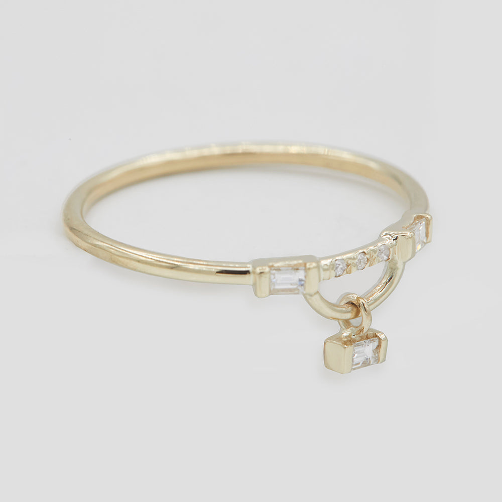 Gravity baguette diamond balance shake ring