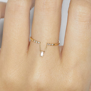 Gravity chain baguette diamond ring