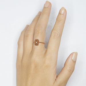Elements baguette champagne diamond rose gold chain ring
