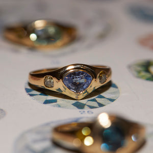 Neptune trillion light blue sapphire diamond ring
